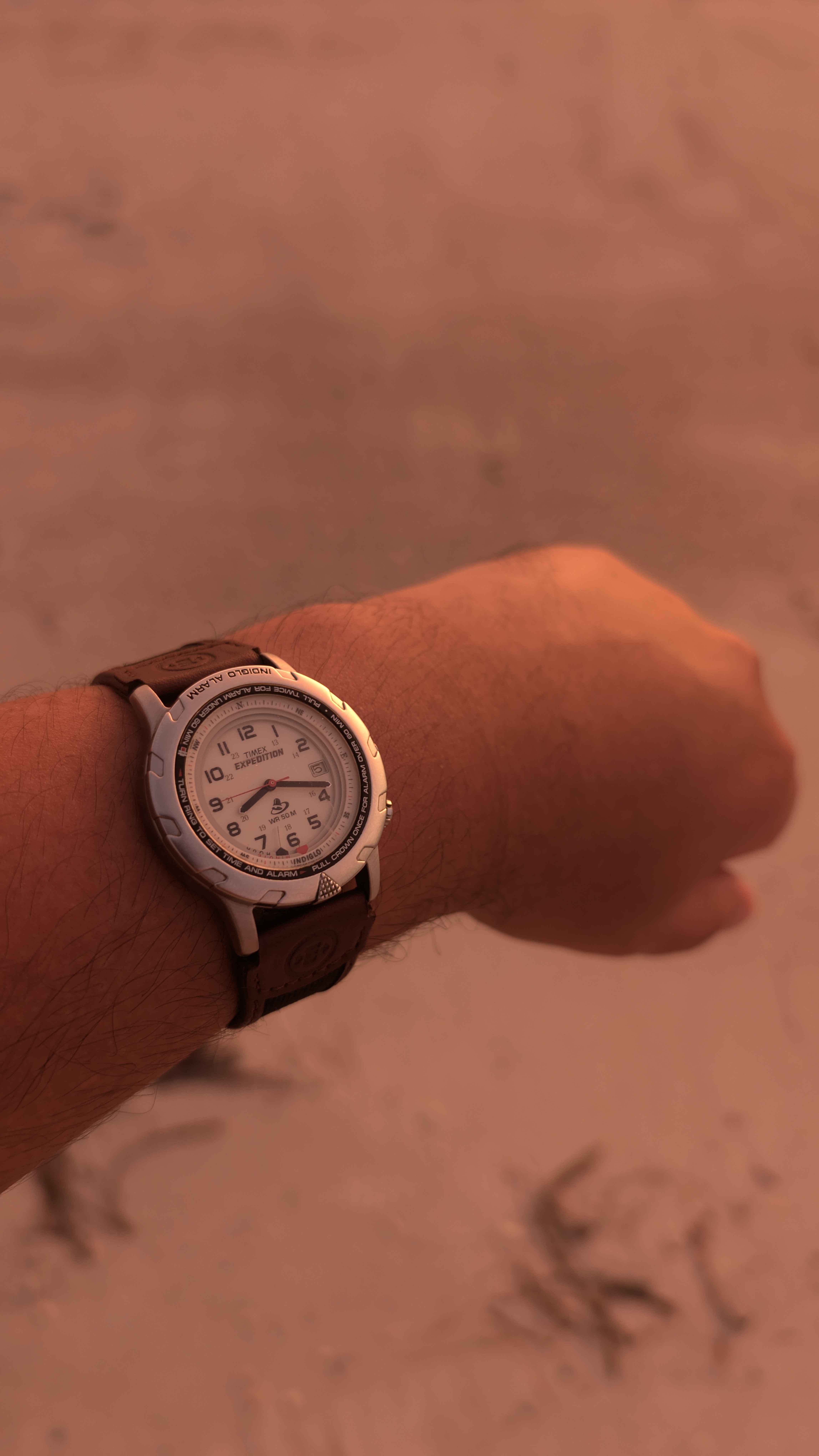 Showing watch by sunset